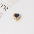 Macro view of gold heart charm bead with blue stone and micro pavé zircon inlay - 10mm / Gold Plated Blue