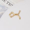 Close-up of golden lava texture OT toggle clasp for pearl necklaces and bracelets - Irregular Hammered (04#)