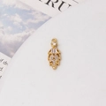 Macro view of gold plated fan-shaped leaf pendant with micro-paved cubic zirconia - 03# Slender Leaf Style (7x18mm)