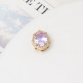 Detailed macro view of a hexagonal gold bead with purple gemstone and zircon inlay - 06# Light Purple Oval Hexagonal Lace (13*15mm)