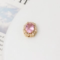 Macro shot of oval pink gemstone pendant with gold base and zircon stones - 08# Pink Oval Victorian Style (13*14mm)