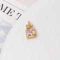 Macro view of perfume bottle charm with purple zircon and pavé butterfly details - Light Purple Perfume Bottle