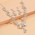 Elegant silver bridal jewelry set with floral vine design and teardrop rhinestones - 868 Silver White 2-Piece Collection