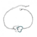 Silver interlocking heart bracelet with light blue crystals and adjustable chain link - Aquamarine