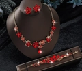Elegant gold-tone bridal jewelry set with red crystal flowers, necklace and bracelet - Gold Red Necklace Earrings Bracelet (02 Gold Red 3-piece)