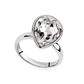 Elegant silver ring featuring a large pear-cut clear crystal in a polished bezel setting - White