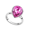 Elegant silver ring featuring a large pear-shaped pink crystal and polished metal band - Purplish Red