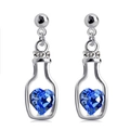 Silberne Flaschen-Ohrringe mit einem tiefblauen Herzkristall und kleinen Diamanten - Saphirblau