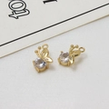Macro view of gold butterfly charms with sparkling cubic zirconia and hanging loops - Butterfly Style 04 (12*13mm)