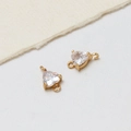 Detail of heart-shaped gold plated connector charms with clear cubic zirconia for DIY jewelry - Heart Connector 6*11mm