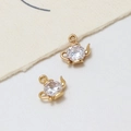 Macro detail of gold-plated teapot pendant featuring a large circular cubic zirconia stone - Teapot Style 12*13mm
