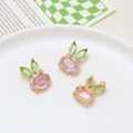 Detailed close-up of rabbit pendants with pink body and green marquise ears for DIY jewelry - Rabbit Style / Pink