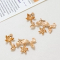 Pendentif fleur et branche doré pour la fabrication de bijoux vintage et loisirs créatifs - Style 07-21x40 (Vrac)