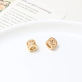 Perla cilindrica placcata oro con pavé di zirconi e motivo a onde traforato - Stile onda traforata (01#7.5*6.5mm)