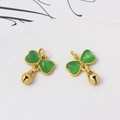 Detail view of gold heart pendants with green stones and hanging bells for DIY jewelry - Green Heart Bell Style (LF2836)