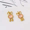 Detail view of pink stone rabbit charms in matte gold finish for DIY jewelry crafting - 9*16mm / Pink Rabbit Head Style (LF2836)