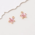 Close-up of pink flower charm pendants with gold base and zircon petals for DIY jewelry - 8*10mm / Pink