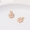 Macro view of gold-plated flower pendants with marquise-cut cubic zirconia crystals - Style 05 (9*12mm)