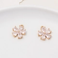 Macro detail of two gold-plated flower pendants with sparkling zircon crystal petals - Minimum 2 Pieces / Gold Bowknot Style (01#13*16mm)