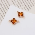 Gouden klaver connector met amber kristal en dubbele lussen voor DIY sieraden maken - Eenheidsprijs / koffiekleur