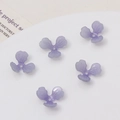 Purple frangipani resin flower petals with pearl finish and center hole for DIY jewelry - 12mm