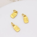 Macro detail of three gold matte finish Fu character charms for DIY jewelry making - "Fu" Character Small Tag Style (03# Small Tag 5x10mm)