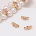 Detailed view of gold flower and butterfly spacer beads with pink cubic zirconia on pearls - Light Purple Small Butterfly (11#Light Purple-Small Butterfly)