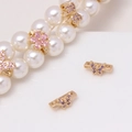 Macro detail of gold flower and butterfly spacers with micro-set zircons for pearl jewelry - Violet Small Butterfly (18#Violet-Small Butterfly)
