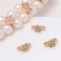 Macro view of gold-plated star spacers with green zircons for DIY jewelry making - Olive Green Blossom Style (23#Olive Green-Blossom)