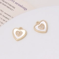 Macro view of gold heart pendants with natural shell inlay and tiny pavé diamonds - 14# Heart-shaped Pendant (13*14mm)