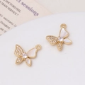 Macro shot of gold butterfly charms with white shell wings for DIY jewelry making - 16# Butterfly Pendant (14*16mm)