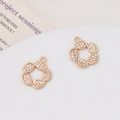 Detail of gold-plated flower pendants with pavé-set cubic zirconia and hanging loops - Twisted Flower Style (06#)