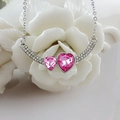 Collana romantica in argento con pendente curvo, cuori in cristallo rosa e pavé di zirconi - Rosa Rossa