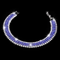 Sparkling four-row rhinestone bracelet with blue and white crystals on silver base - Sapphire Blue