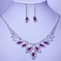 Elegant bridal jewelry set featuring red marquise gemstones and crystals on a silver base - Red