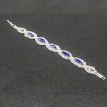 Elegant silver-plated bridal bracelet featuring marquise-cut blue stones and crystals - Blue (661-1-55)