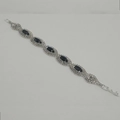 Silver plated bridal bracelet featuring navy blue marquise stones and crystal halo details - Black (661-3-55)