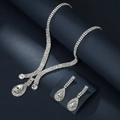 Elegant silver bridal jewelry set with sparkling teardrop rhinestones on dark base - Necklace And Earrings