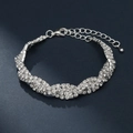 Elegant silver-tone rhinestone bracelet with multi-row wave design and lobster clasp - Fashion Rhinestone Bracelet
