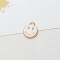 Detailed close-up of a golden metal smile pendant with white enamel finish for DIY jewelry - 02#White