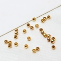 Macro shot of 18K gold plated spacer beads for DIY jewelry making on white fabric - Polished Ball / 2.5mm (ai-100 Pieces/Pack)