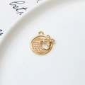 Macro view of gold-plated moon and star charms with micro-pave cubic zirconia stones - Moon and Star Style (01#)
