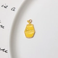 Close-up of yellow drip oil banana milk pendant charm for DIY jewelry making - Minimum 10 Pcs / Banana Milk