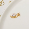Close-up of gold-plated link charm with cubic zirconia main stone and heart detail - Heart Shape Double Hanger Connector (LF2389)