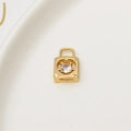 Macro shot of gold-plated square lock pendant with heart cutout and zircon inlay - No.01 / Heart Lock (01#)