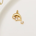 Macro view of gold-plated dolphin pendant with three sparkling cubic zirconia stones - No.02 / Dolphin (02#)
