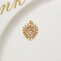 Macro view of gold copper evil eye sunburst pendant with micro-set zircon stones - Sun Pattern Style (04#)