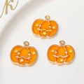 Orange enamel pumpkin charms with gold edges and yellow stars for Halloween jewelry DIY - Orange Pumpkin