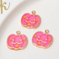 Pink enamel Halloween pumpkin pendants with gold metal outlines and star details - Pink Pumpkin