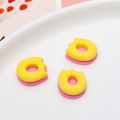Miniature resin donut charms in yellow and pink for DIY phone case and earring crafts - Bitten Donut Shape (07#)